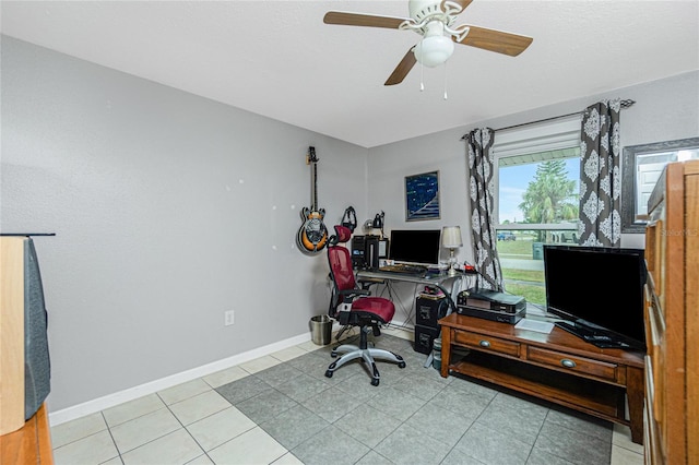 home office featuring ceiling fan and light tile patterned flooring