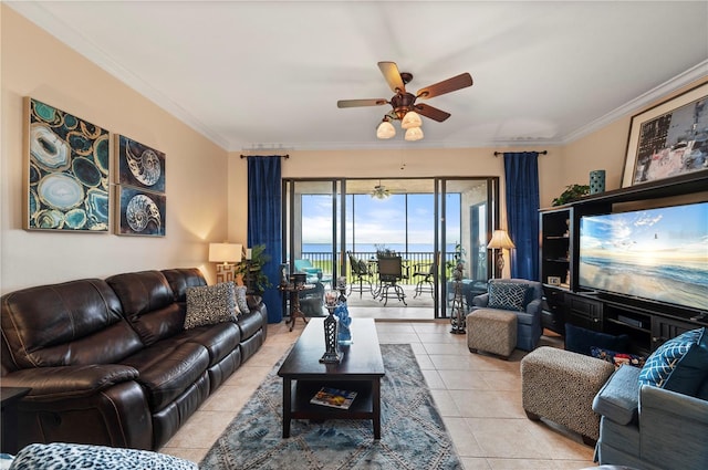 tiled living room with ceiling fan and ornamental molding