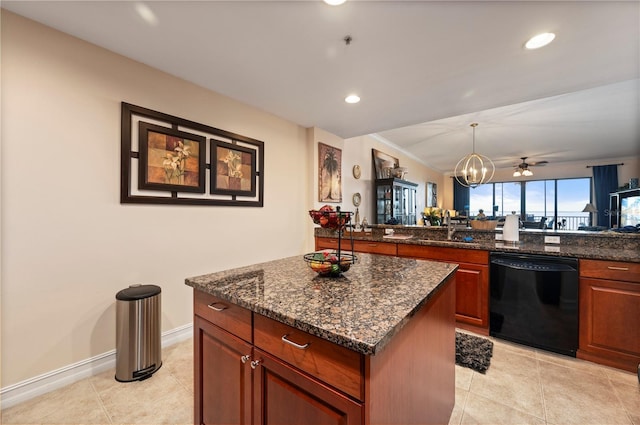 kitchen featuring black dishwasher, pendant lighting, dark stone counters, and a center island