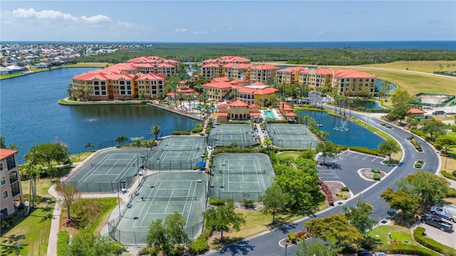 birds eye view of property featuring a water view