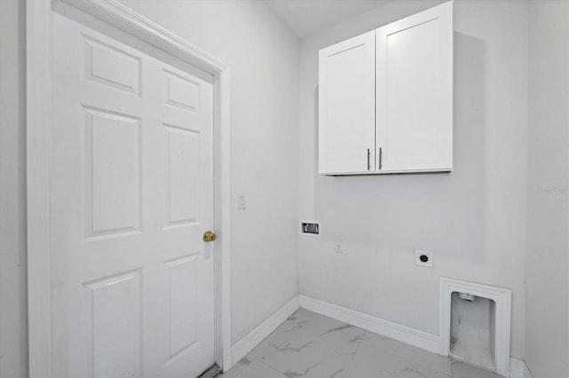 washroom with cabinets and electric dryer hookup