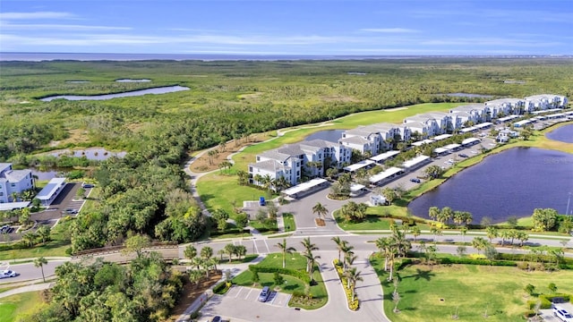 drone / aerial view featuring a water view