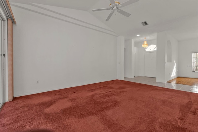 interior space featuring vaulted ceiling and ceiling fan