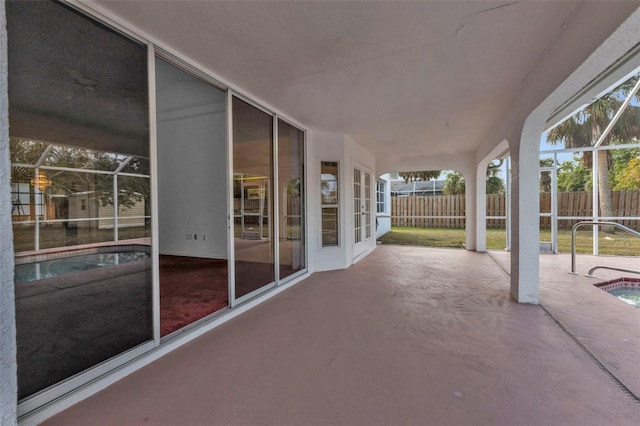 view of patio / terrace featuring a lanai and a fenced in pool