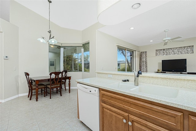 kitchen with pendant lighting, ceiling fan, plenty of natural light, and dishwasher