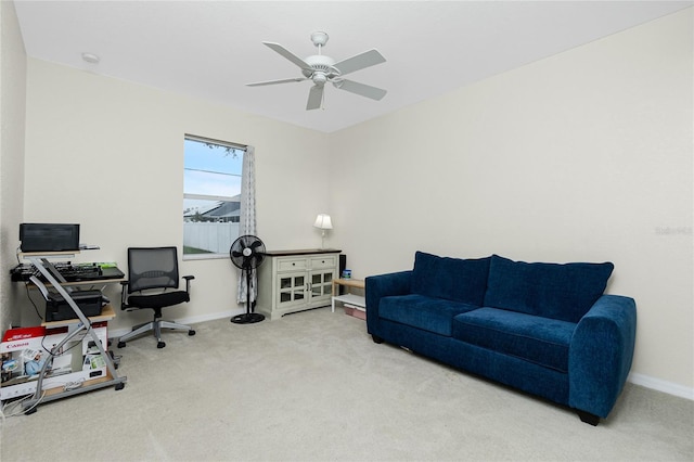 home office with carpet flooring and ceiling fan