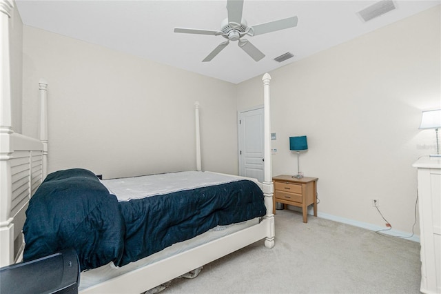 bedroom with light carpet and ceiling fan