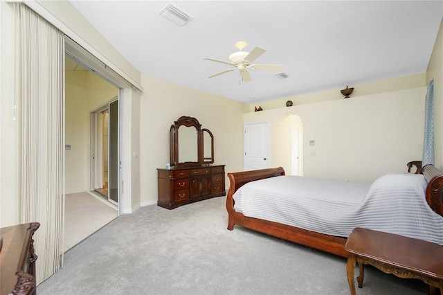 bedroom with ceiling fan and light colored carpet