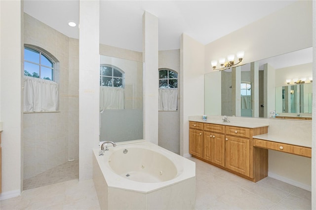 bathroom with vanity, shower with separate bathtub, and tile patterned floors