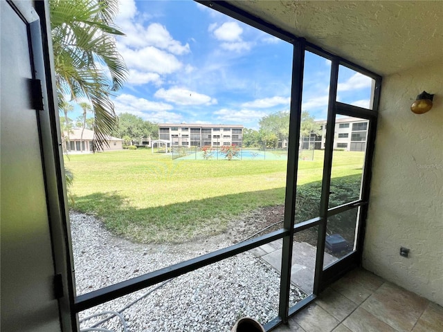 view of unfurnished sunroom