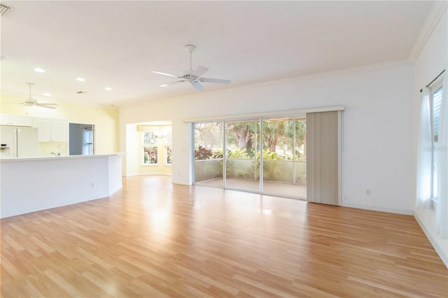 unfurnished living room featuring light wood-type flooring, ceiling fan, and crown molding