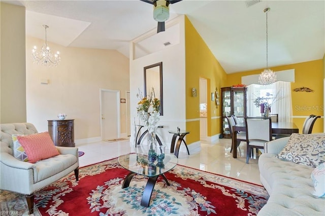 tiled living room with lofted ceiling and an inviting chandelier