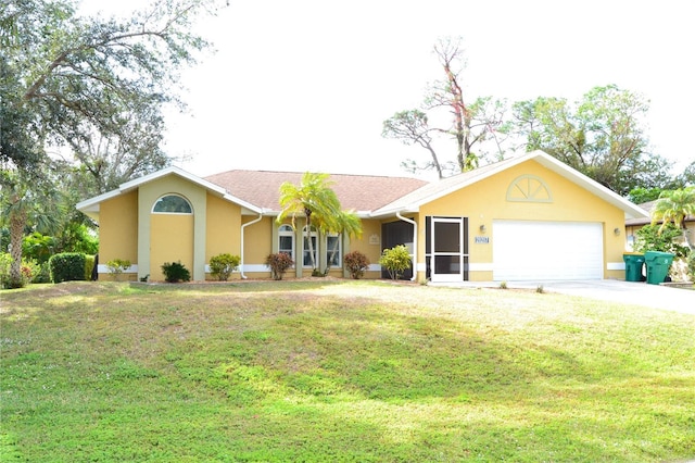 ranch-style home with a garage and a front yard