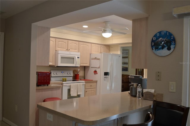 kitchen featuring white cabinetry, white appliances, crown molding, kitchen peninsula, and ceiling fan