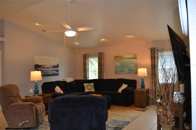 tiled living room with lofted ceiling and ceiling fan