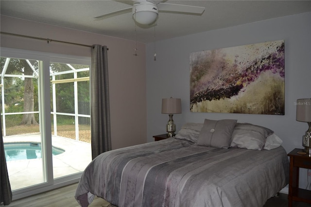 bedroom with access to outside, light hardwood / wood-style floors, and ceiling fan