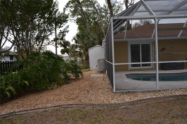 view of yard with a lanai and a patio area