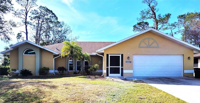 ranch-style house with a garage and a front yard