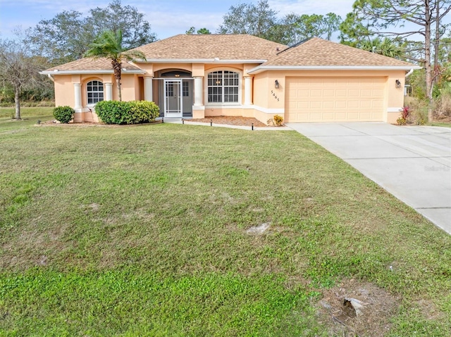 ranch-style home featuring a front yard and a garage