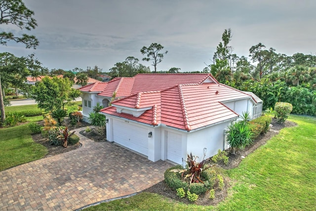 view of side of property with a yard