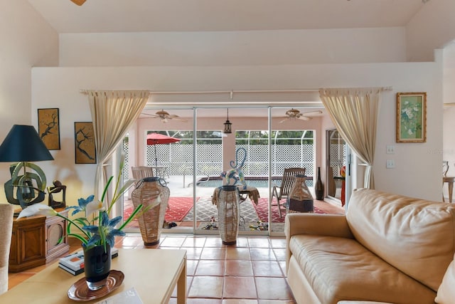 tiled living room featuring ceiling fan