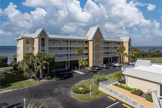 view of building exterior featuring a water view