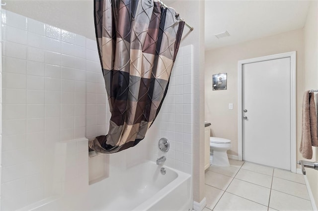 bathroom with tile patterned flooring, shower / bath combination with curtain, and toilet