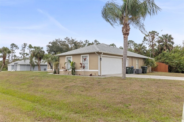 single story home featuring a garage, central air condition unit, and a front lawn