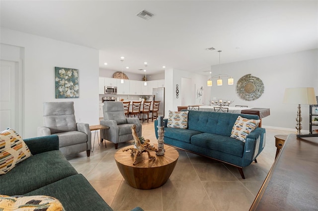 living room with light tile patterned floors