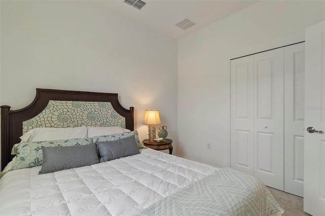 carpeted bedroom featuring a closet