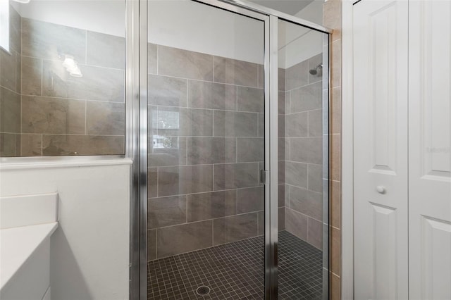 bathroom featuring walk in shower