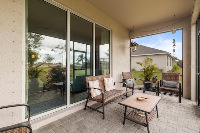 exterior space featuring outdoor lounge area and a patio