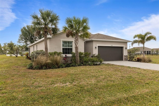 single story home featuring a front lawn and a garage