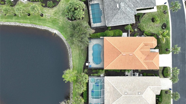 drone / aerial view with a water view