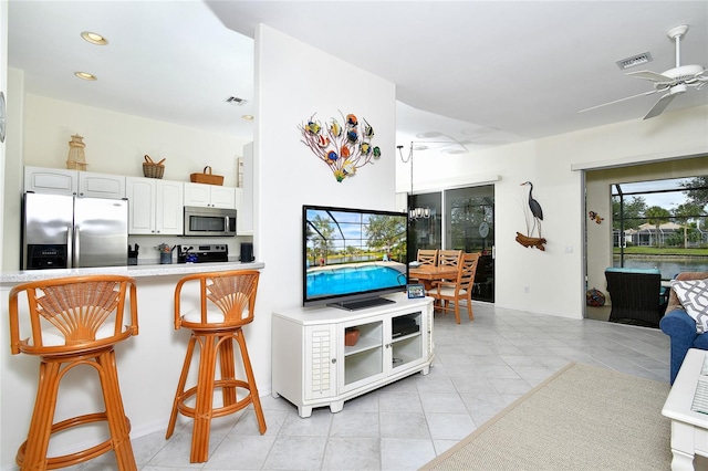 living room with ceiling fan