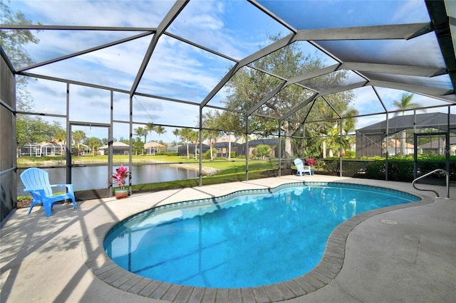 view of swimming pool with a water view, a patio area, and a lanai