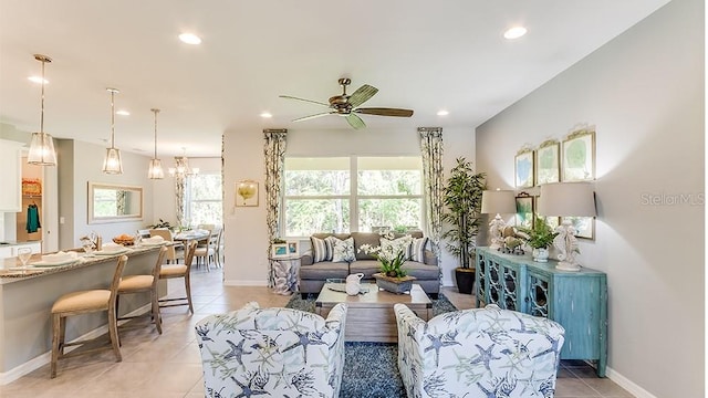 tiled living room with ceiling fan