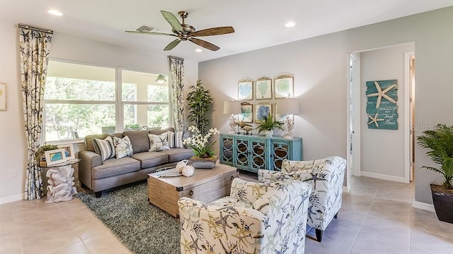 tiled living room with ceiling fan