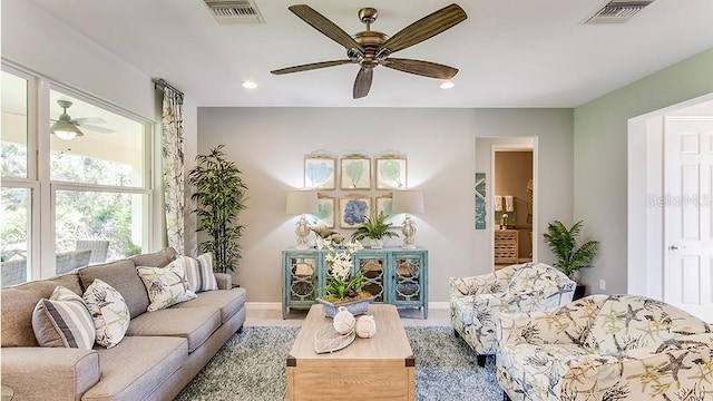 living room with ceiling fan