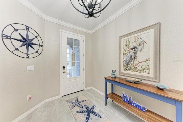 foyer featuring a chandelier and ornamental molding