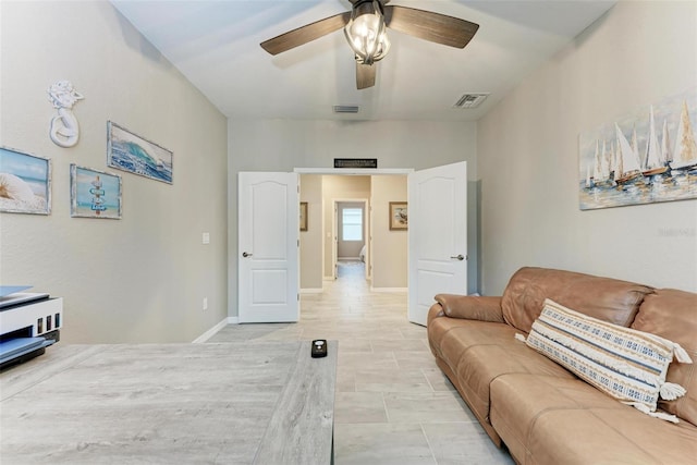 living room featuring ceiling fan