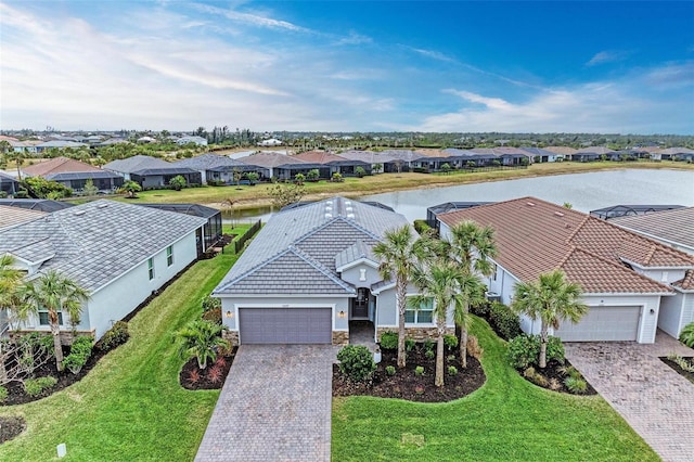 bird's eye view with a water view