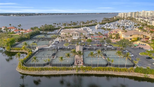 birds eye view of property with a water view