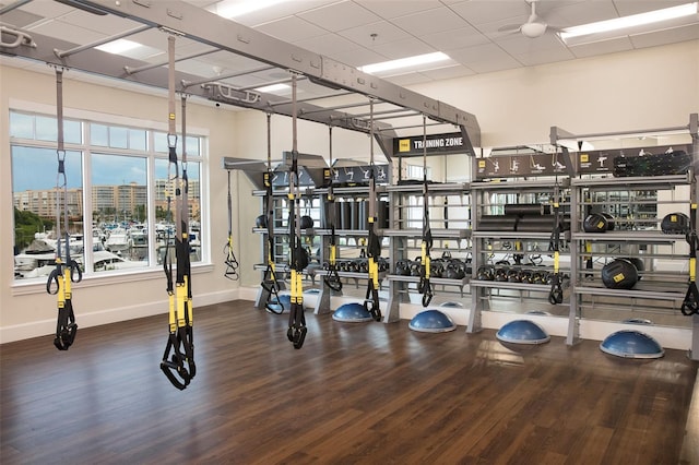 gym with hardwood / wood-style floors