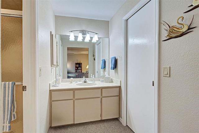 bathroom featuring vanity and walk in shower