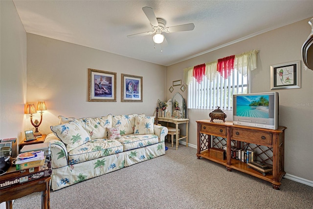 living room with carpet floors and ceiling fan