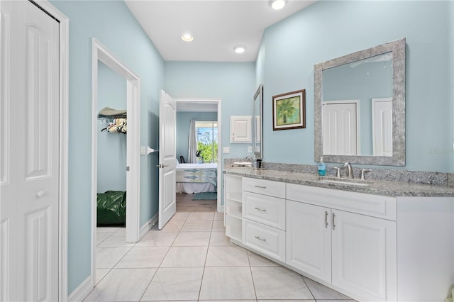 bathroom featuring vanity and tile patterned flooring