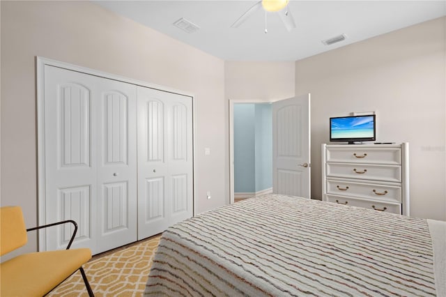 bedroom with a closet and ceiling fan