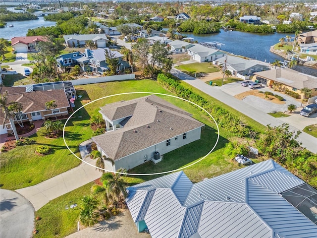 drone / aerial view with a water view