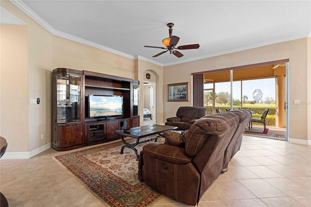 tiled living room featuring ceiling fan and crown molding